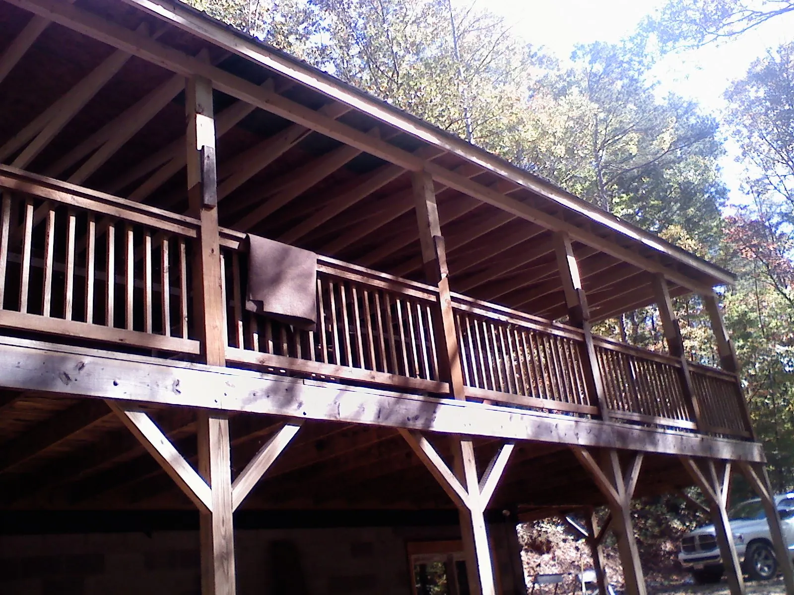 Timber framing under a new elevated porch and deck — Roof Leak Repair in Revere by Roofing Brothers